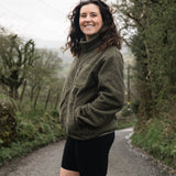 woman in khaki fleece and shorts