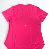 Pink t-shirt with a pocket on a white background