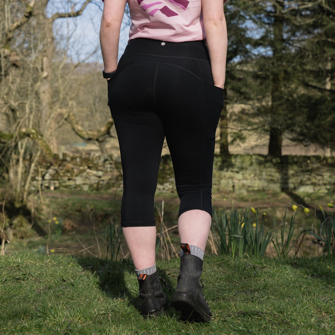 back of black capri leggings with pockets