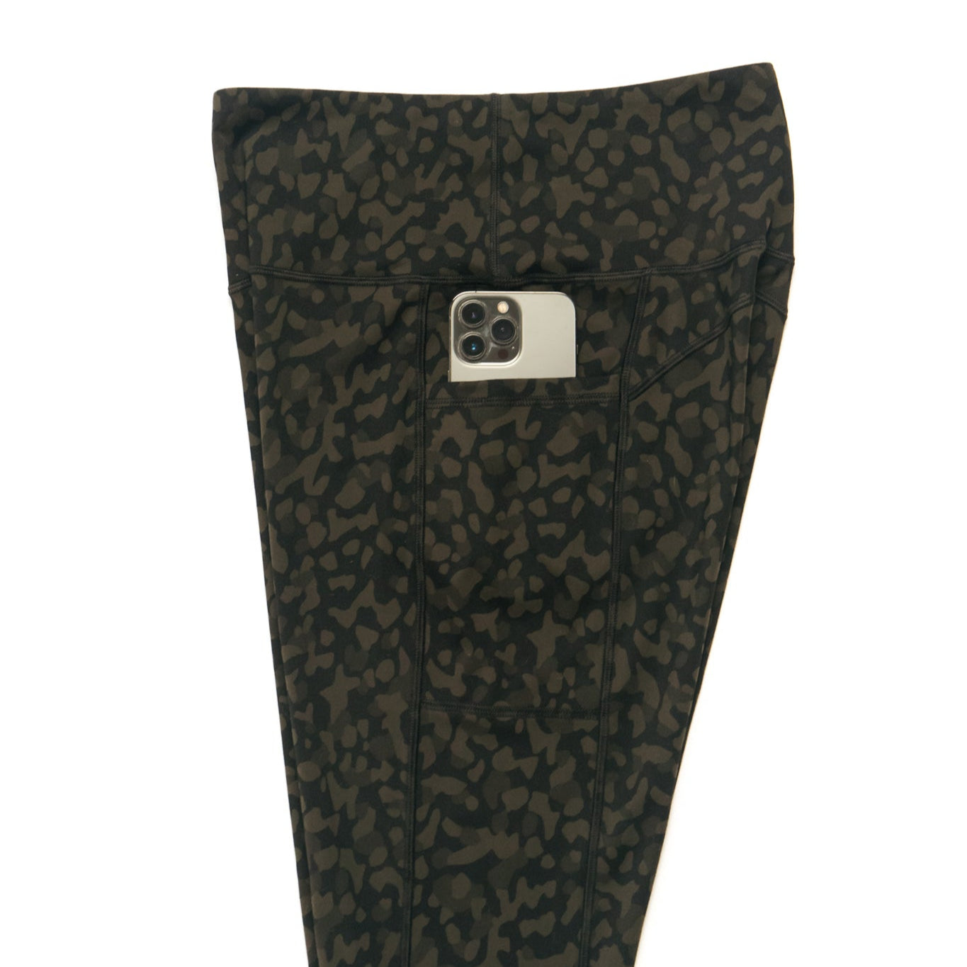 Dark patterned pants with a pocket on a white background
