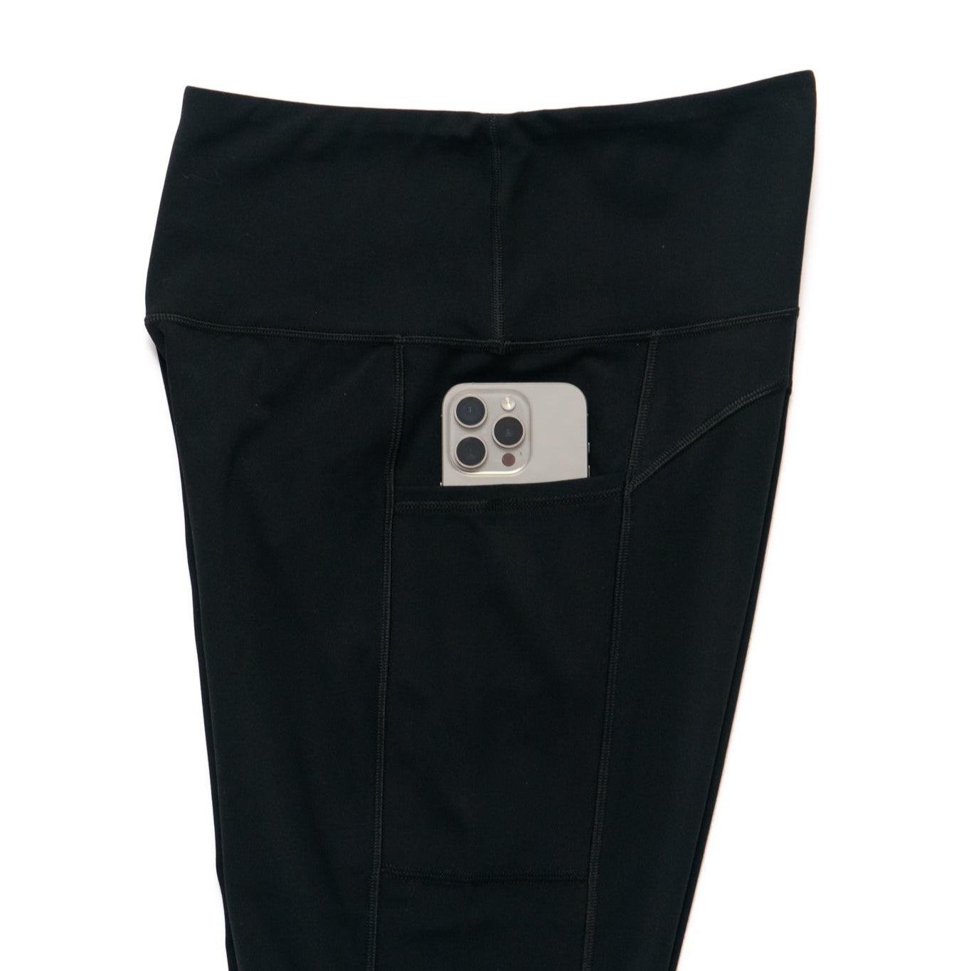 side view of capri leggings showing phone in pocket