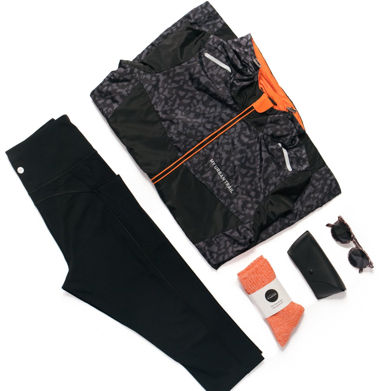 black print and orange waterproof with outfit