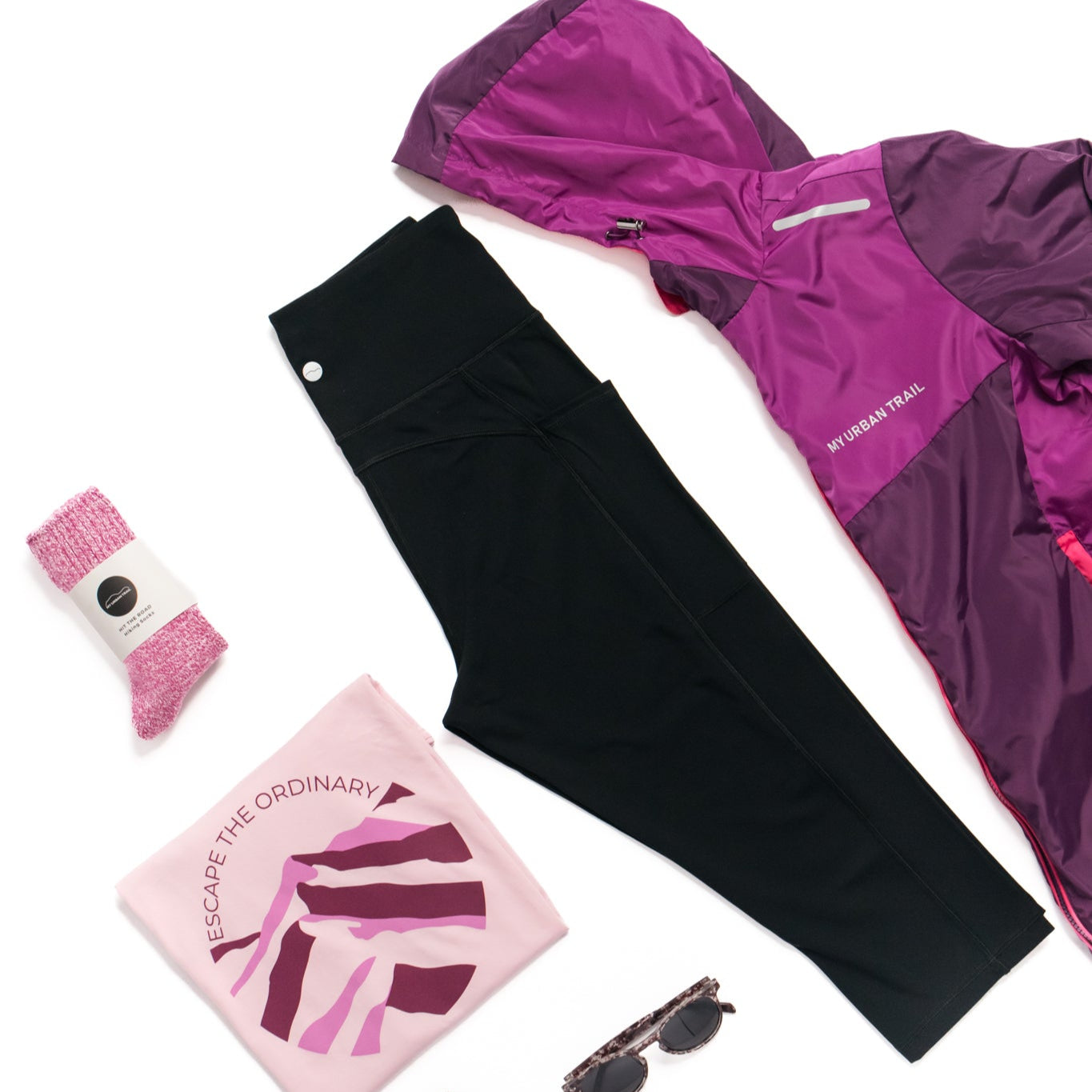 Purple waterproof with matching outfit and black capri leggings